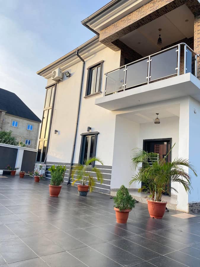 Two storey house glass balcony